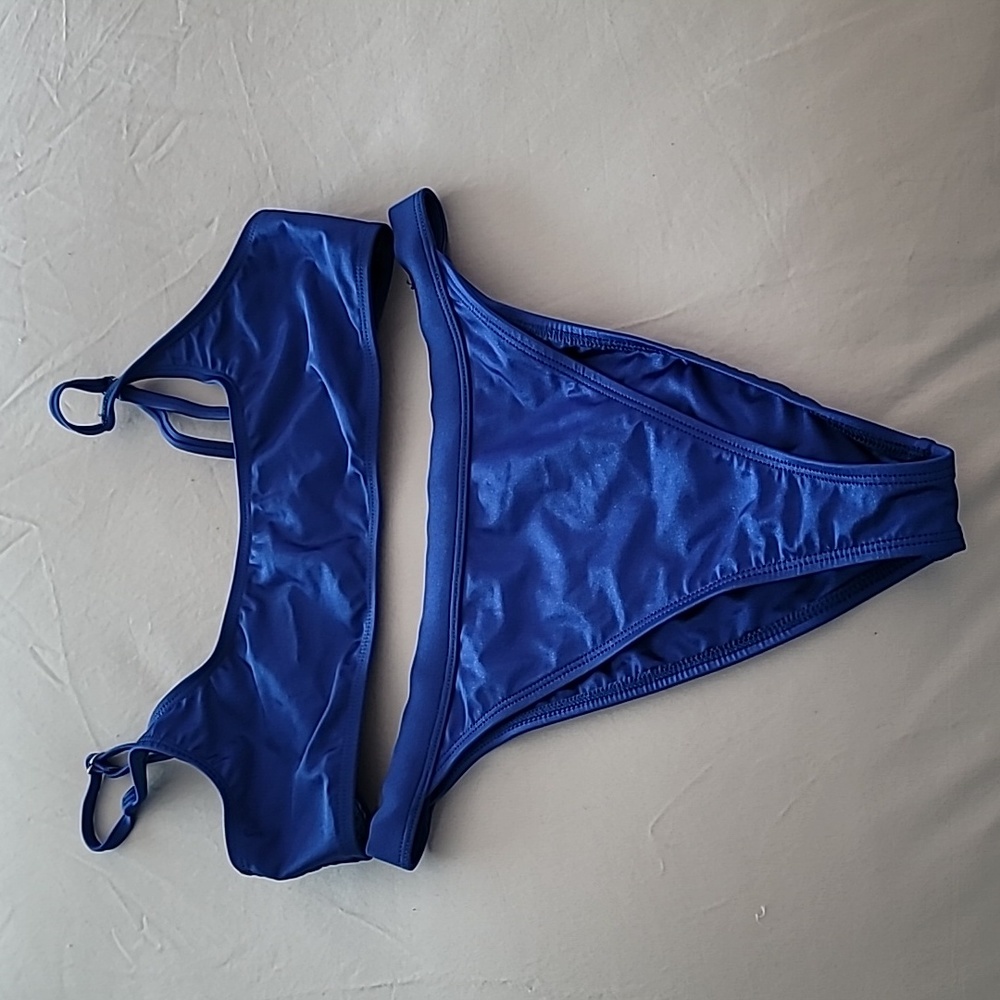 NWOT bikini. Never worn. By the time I took off the tags, I lost 30lbs